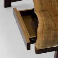 Hand-carved and set convenient drawers on The Lilienfeld Desk