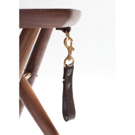 Custom leather strap closure on the handmade Langhorne artist's stool