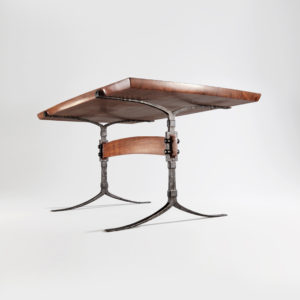 Underside angle view of the Sandhill Table w/ hand-forged iron