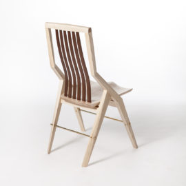 Rear angle shot of the handmade Reyes modern dining chair