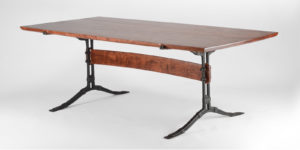 Our handmade Salin Trestle Table w/ hand-forged iron