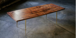 Des Tombe dining room table handcrafted from California walnut veneer