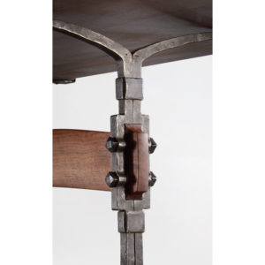 Underside close-up of the hand-forged iron trestle legs on The Sandhill Table
