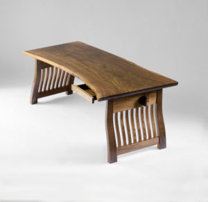 The custom-designed and hand-carved Lilienfeld office Desk