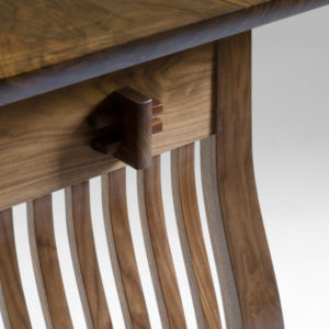 Hand-carved wooden connections on the spindle legs of The Lilienfeld Desk