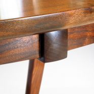 Close-up view of the handmade California Walnut fittings on our handcrafted Murdock Table for dining or gaming