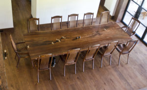 Handcrafted Filip Dining Table w/ basalt base designed for 12 people