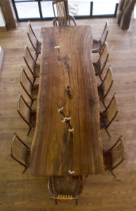 An aerial view of our handmade Filip Dining Table w/ Columnar Basalt Base