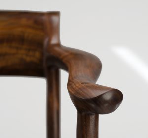 View of the arm detail on the Sumi Chair, our handmade low back arm chair