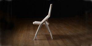 Side angle view of our handmade dining chair, the Reyes Chair